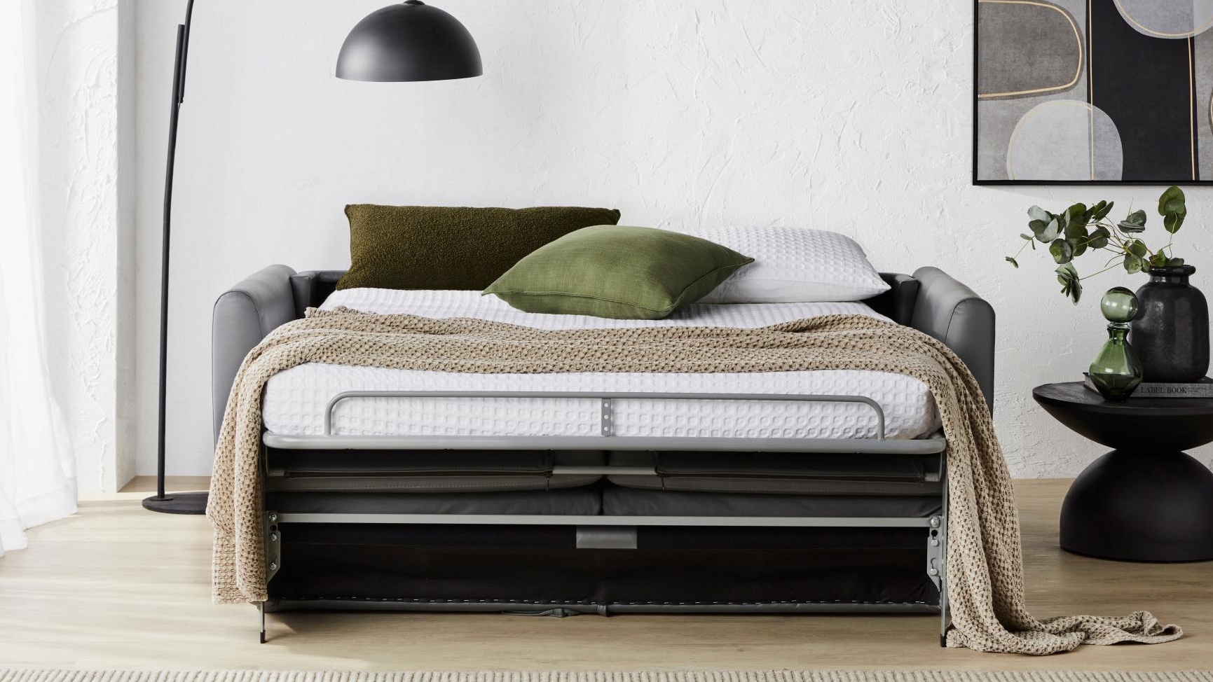 Grey leather sofa bed online