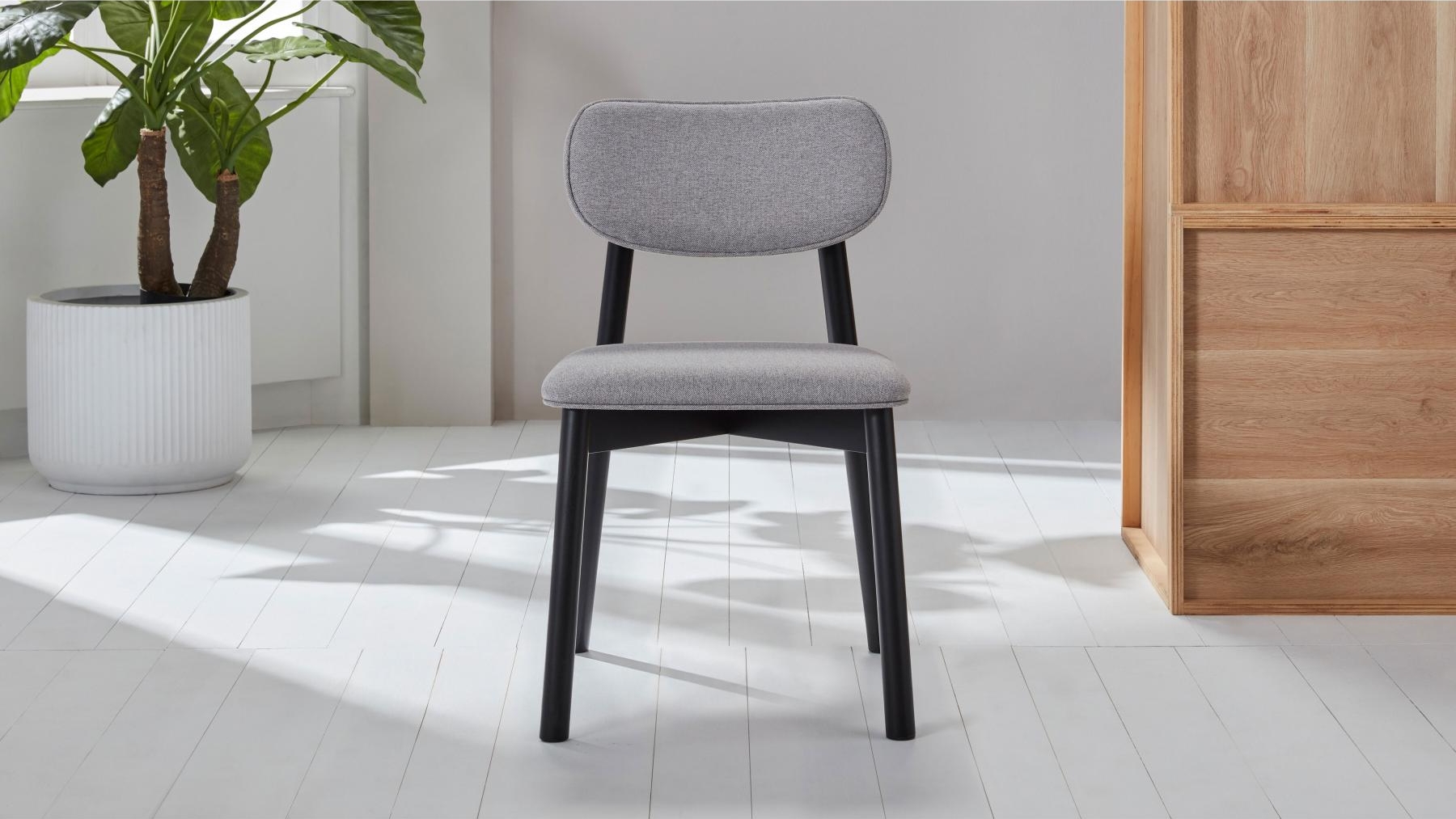 Linz Black Dining Chair in Grey Fabric | Domayne